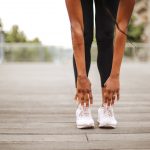 physical well-being, women warming up to run